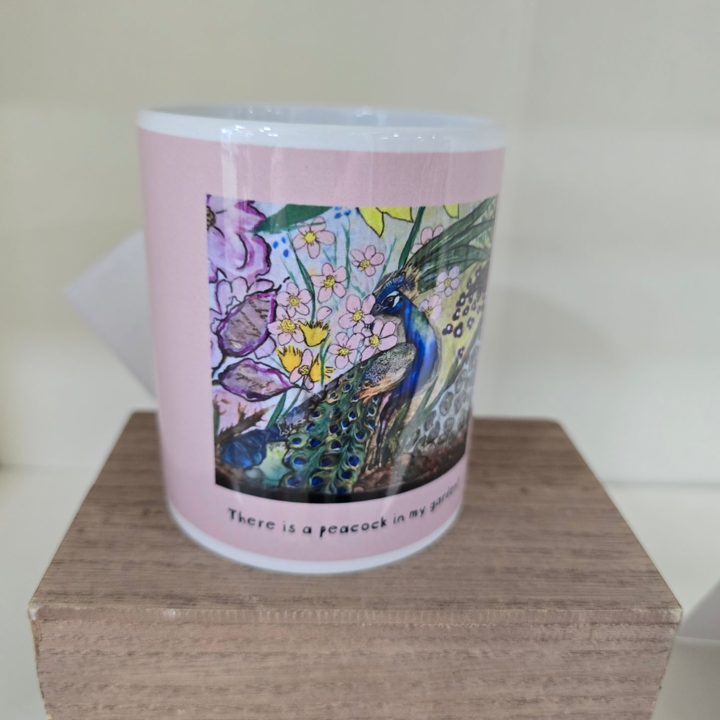 "There is A Peacock in my Garden" Mug